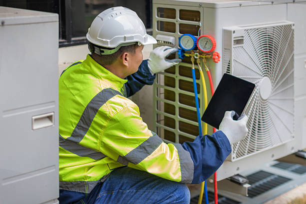 Professional Air Duct Cleaning technician working in Springfield, OH